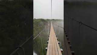 Influencer Crosses Bridge Into Clouds Above 2,500Ft Tall Waterfall