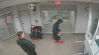 Justin Bieber arrest video: Star seen taking sobriety test and doing push-ups whilst in custody