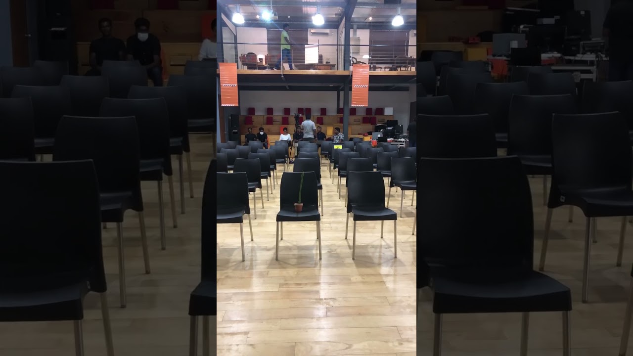 When you can’t decide where to sit at a meeting. 