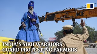 India’s sword-wielding Sikh warriors guard protesting farmers