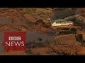 Brazil dam burst: Rivers of thick red mud  - BBC News