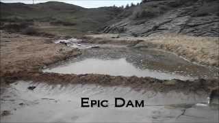 Epic Dam bursts