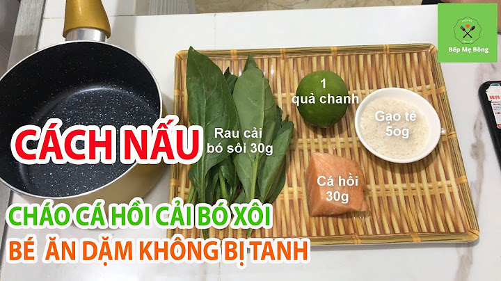 Cháo của nấu với rau cải bó xôi