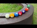 Who will win a marble race on a track?Marble tracks, marble races, and rolling ball sculptures
