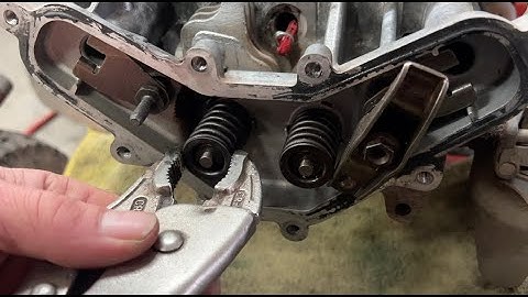 Hoe u klepveren van Briggs- of Kohler-motoren verwijdert zonder klepveercompressor. Alleen OHV.