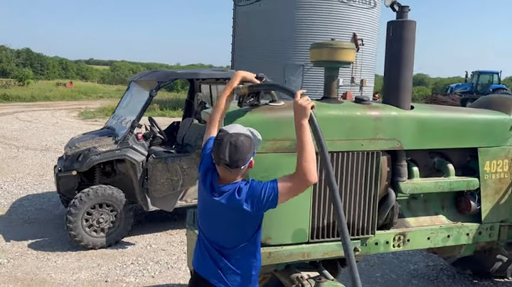 Raking and Baling Hay with 17 year old farmer