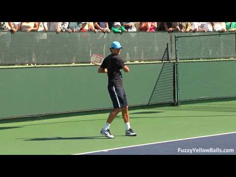 www.fuzzyyellowballs.com Roger Federer hitting forehands in HD from a practice session at the BNP Paribas Open. The series of forehands is at regular speed. The same set is then replayed at half speed. To learn how to hit forehands like Federer and for more HD video, visit www.fuzzyyellowballs.com !