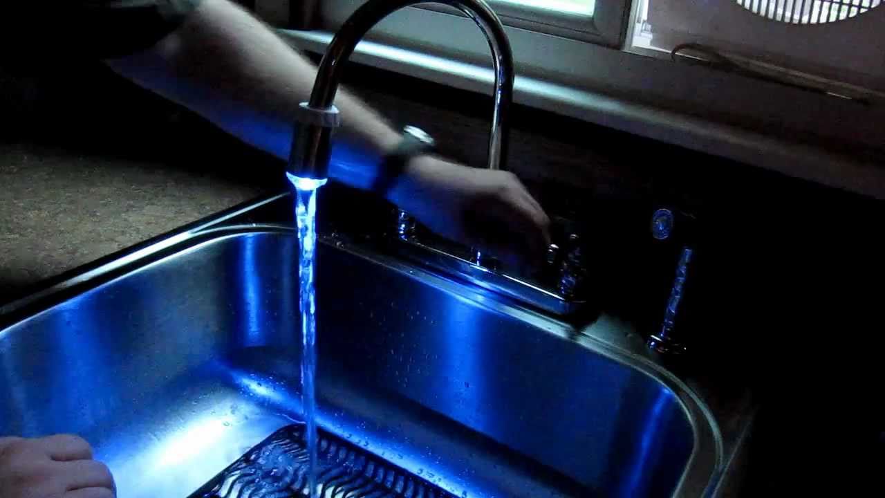 cool color changing faucet attachment- its like a light saber for the kitchen