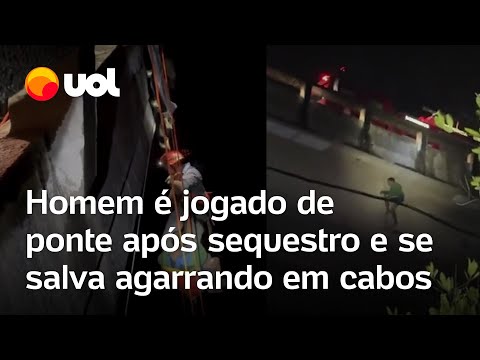 Homem é jogado de ponte após sequestro e se salva agarrando em cabos