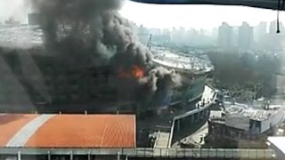 Knews24新闻关注 | 直击虹口足球场火灾现场 申花主场比赛或受影响