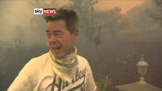 Imagens impressionantes do incêndio florestal que ameaça casas de celebridades nos EUA