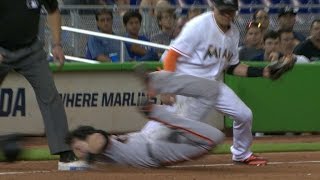 Posey slides awkwardly and lands face-first
