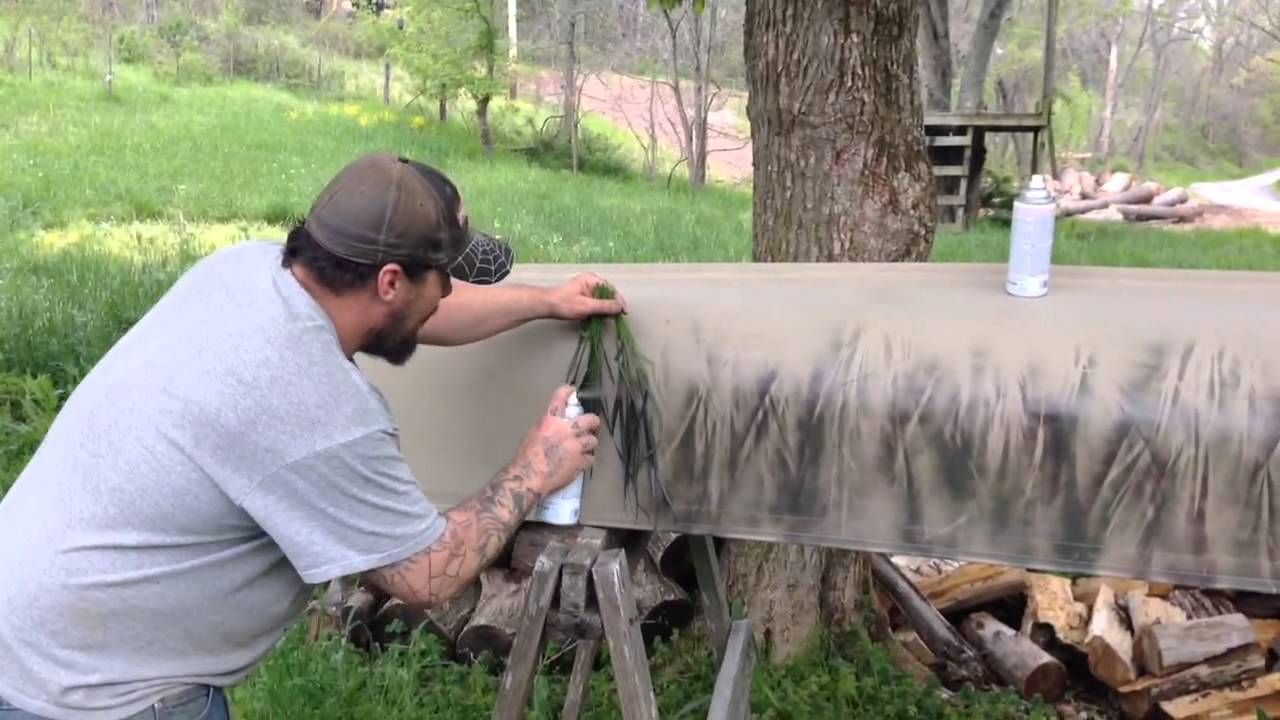 Camouflage canoe - YouTube