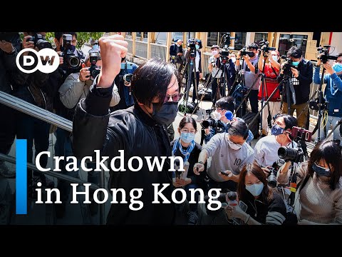 Dozens of Hong Kong activists charged with 'subversion' - DW News.