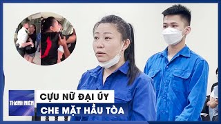 Cựu nữ đại úy ‘đại náo’ Tân Sơn Nhất che mặt ngày hầu tòa vì cướp tài sản