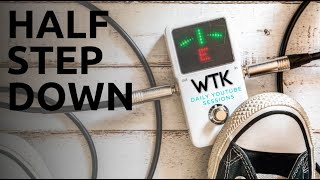 How to tune your guitar down a half step down and why? / Eric Roberts