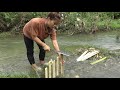 Survival skills: Build fish trap from mud pit catch carp - Survival by hand fishing