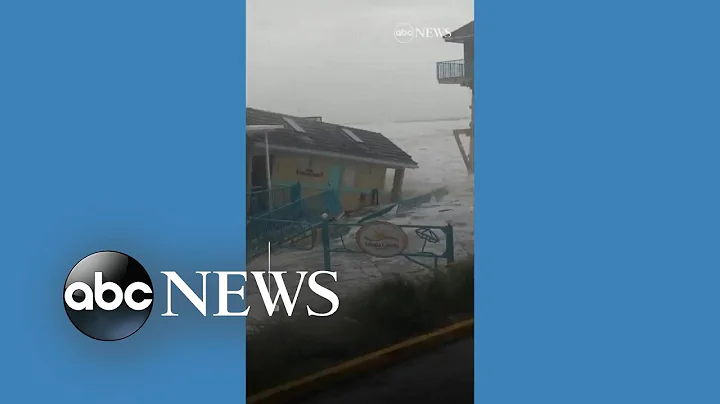 Building collapses into ocean as Tropical Storm Ni...