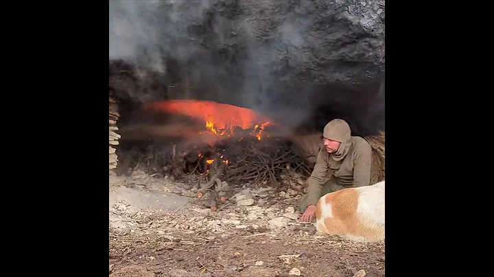 I MADE a CAVE by CARVING the ROCK with FIRE using PRIMITIVE METHODS #camping #diy #bushcraft