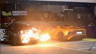 Nissan GT-R vs Lamborghini Aventador SV rev battle, flames &amp; antilag - Serata delle Regine
