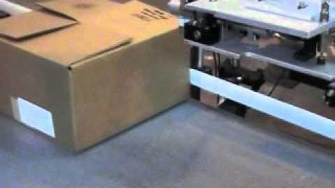 140 Automatic Swing Tamp Blow-On Labeler