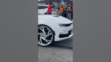 White Chevy Camaro on 26’s Rucci