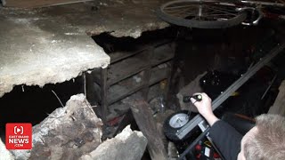 Family Discovers Secret Room Under House After Garage Floor Caves in