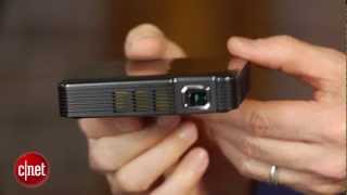 Brookstone's mini projector plays big