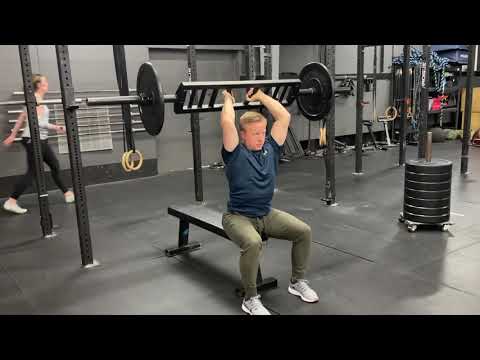 Swiss Bar Overhead Tricep Extensions