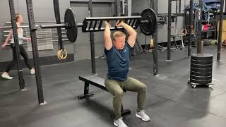 Swiss Bar Overhead Tricep Extensions