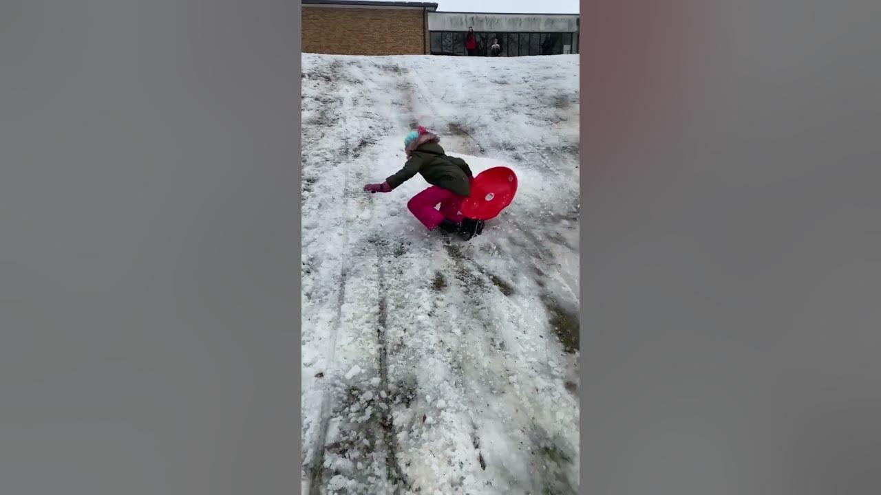 Girl Falls off Sled Going Downhill shorts YouTube