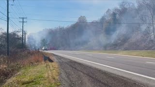 Firefighters battle brush fire, lane closure on U.S. Route 460