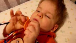 Noah giggles during nap time
