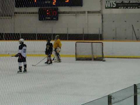 Tyler Ebner (yellow goalie)- School Hockey Tourney...