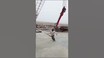 Construction workers run for their lives as massive crane collapses