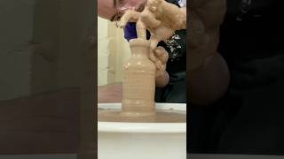 Throwing a small cylindrical vase with a collared neck and flared rim #pottery #throwingclay