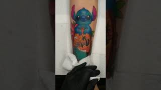 Cute stitch tattoo on girl's arm