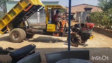 Xe công nông cầu đẩy của gara đông xuân màu vàng rất đẹp, làm lốp đôi tời bụng ..