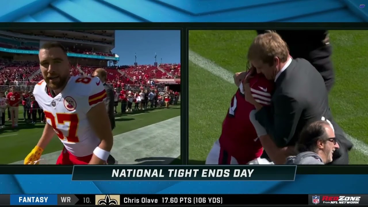 Greg Olsen wrestles with George Kittle during pregame