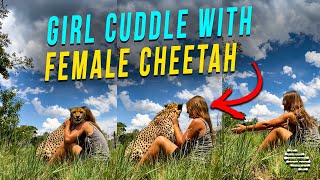 Girl Cuddle With Female Cheetah at a South African Cheetah Project