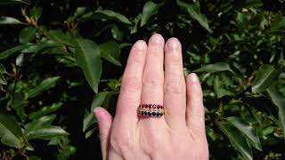 A late Victorian multi precious gem half hoop ring