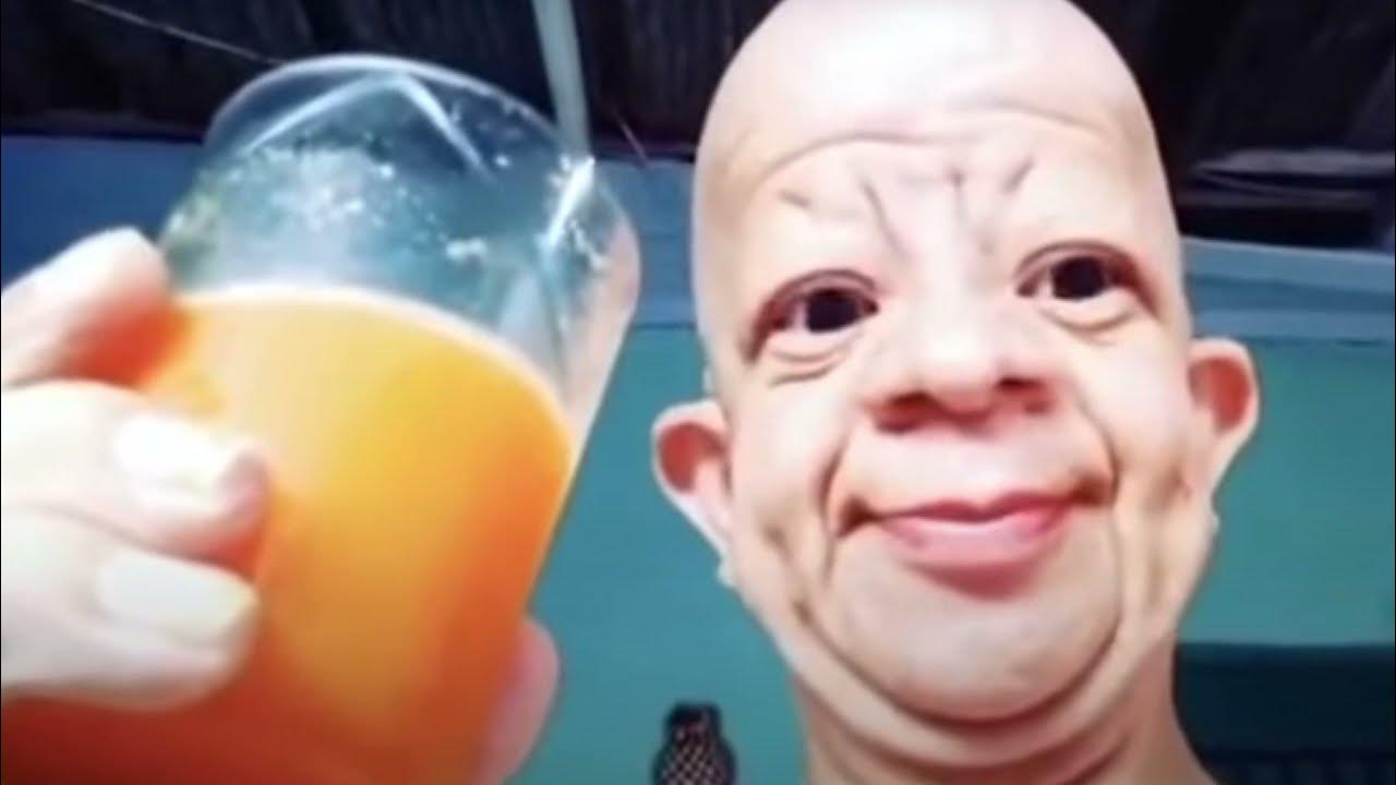 Bald guy drinking orange juice YouTube