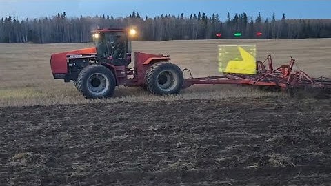 Chisel plowing. 2 Steigers and A Case