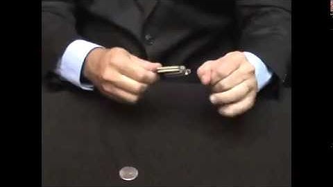 Saturn Magic -Slippery Shell Quarter (w/DVD)(D0128) by Tango Magic - Tricks