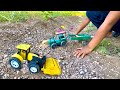 1550 tractor trailer playing and tractor road roller playing round toys