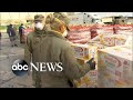Inside 2 massive food banks feeding families affected by COVID-19