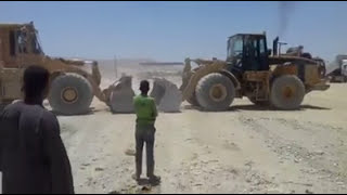 التحدي مابين الـE و الـ GCaterpillar Loader E - G