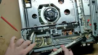 Accessing the Loading Belt on a National DP-350/800/930 VHD Player