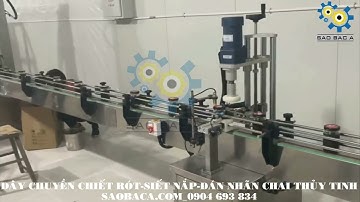 Dây chuyền chiết rót - siết nắp- dán nhãn chai thủy tinh tự động