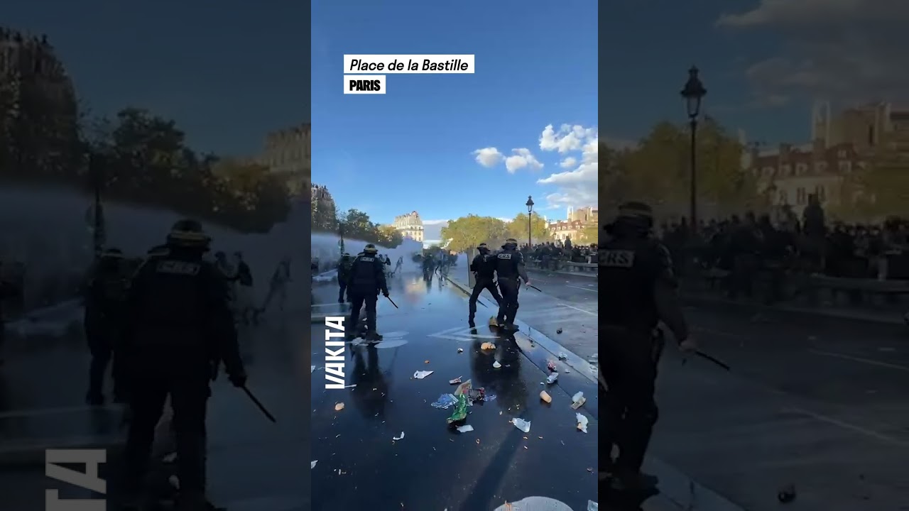 Ce CRS frappe le téléphone de notre journaliste alors qu'il filme les affrontements à Paris